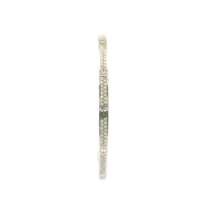 Elegant White Gold Bangle Adorned with Round Brilliant Diamonds