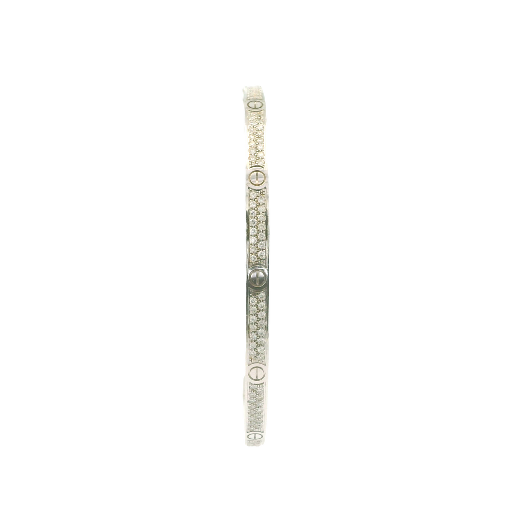 Elegant White Gold Bangle Adorned with Round Brilliant Diamonds